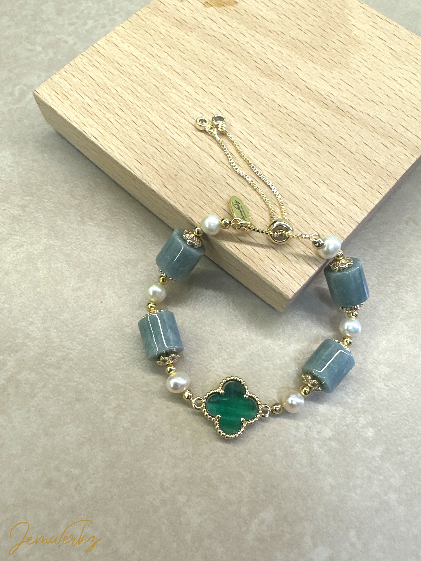 JOELLA 1.1 - Bluewater Jade Barrels with Green Clover Centrepiece and Freshwater Pearls Bracelet