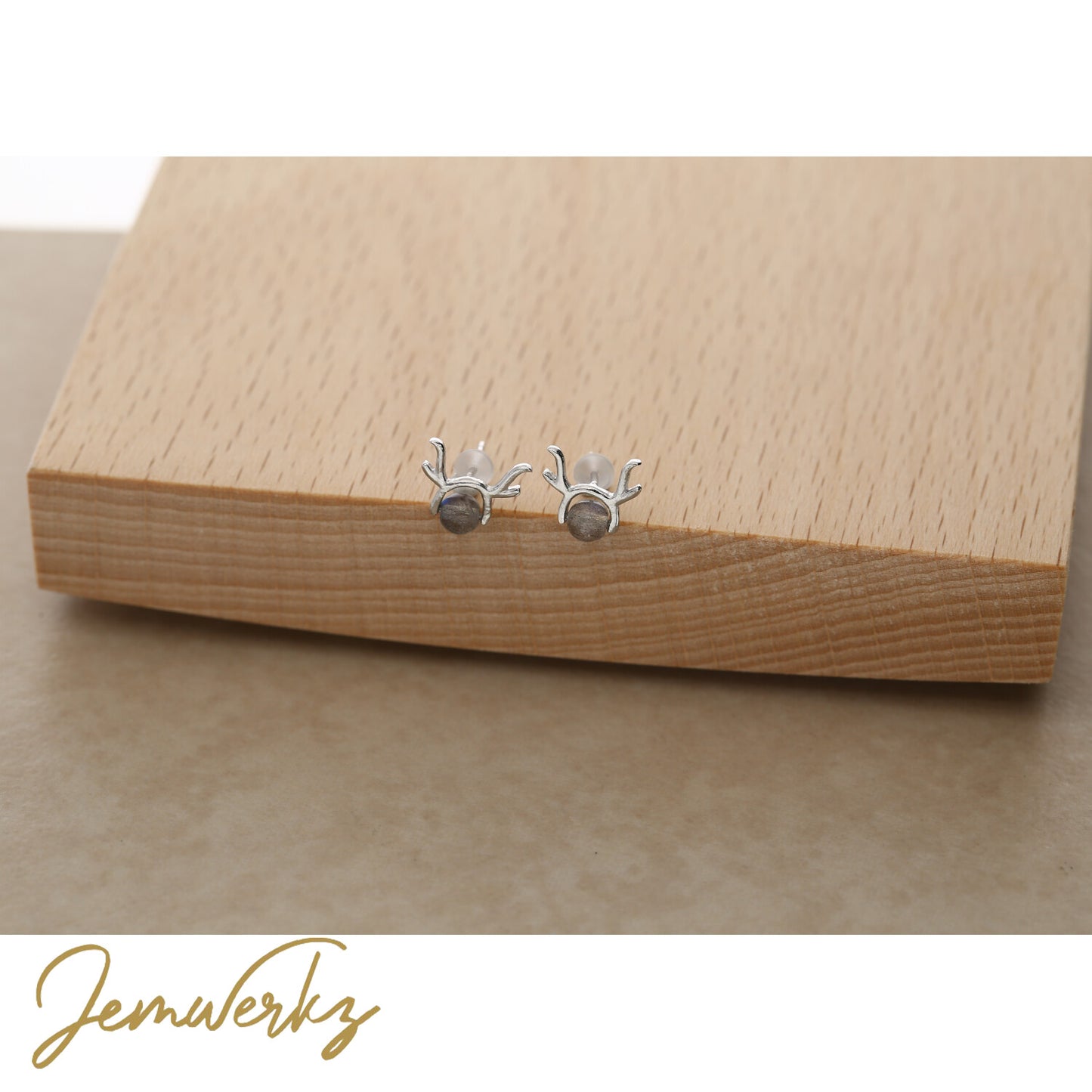 SABINE 1.0 - Black Skeletal Sunstone Deer Earrings