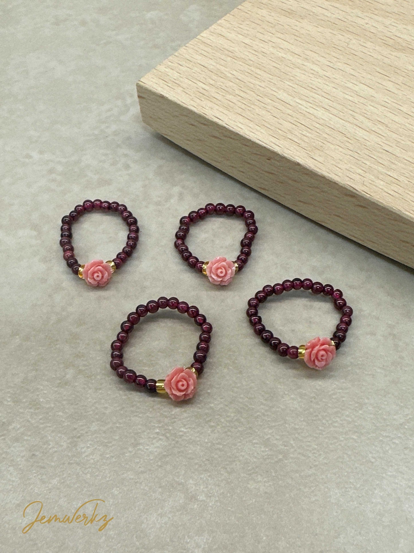 GUMI - Garnet Ring with Tridacna Rose Centre