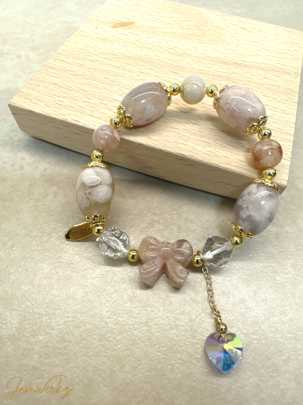 Load image into Gallery viewer, SAGE 1.1 - Sakura Agate Ribbon and Barrel Bracelet with Faceted Clear Quartz and Dangling Heart Charm
